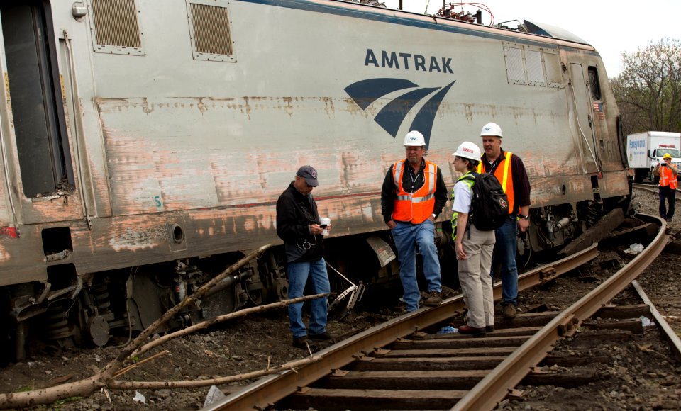 NTSB Recorder Specialist Cassandra Johnson works with officials on the scene of the Amtrak Train #188 Derailment in Philadelphia, PA