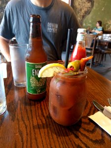 Bacon infused Bloody Mary with Pickled Okra Green beens and of course bacon French Press Lafayette Louisiana
