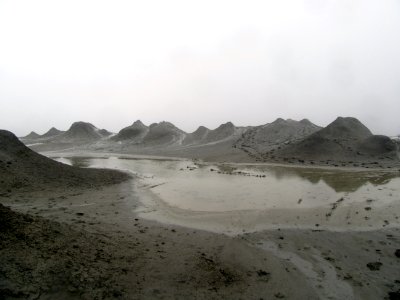 Mud volcanoes and giant mud puddle Azerbaijan photo
