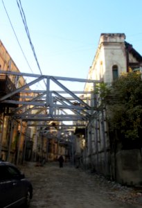 Steel beams holding up buildings Old Town Tbilisi Georgia