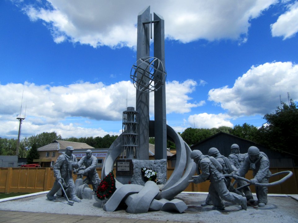 Monument built in 1996 to honor fire fighters 31 who died immediately fighting the blaze and miners and other workers who faught to contain the disaster Chernobyl exclusion zone Ukraine