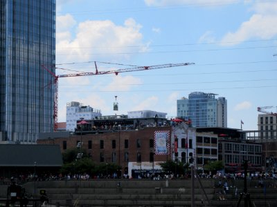 Crane with people watching eclipse Nashville Tennessee
