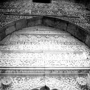 Details on a wall behind the Qutub Minar photo
