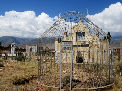 Yurt like cage cemetary Cholpon Ata Kyrgyzstan.