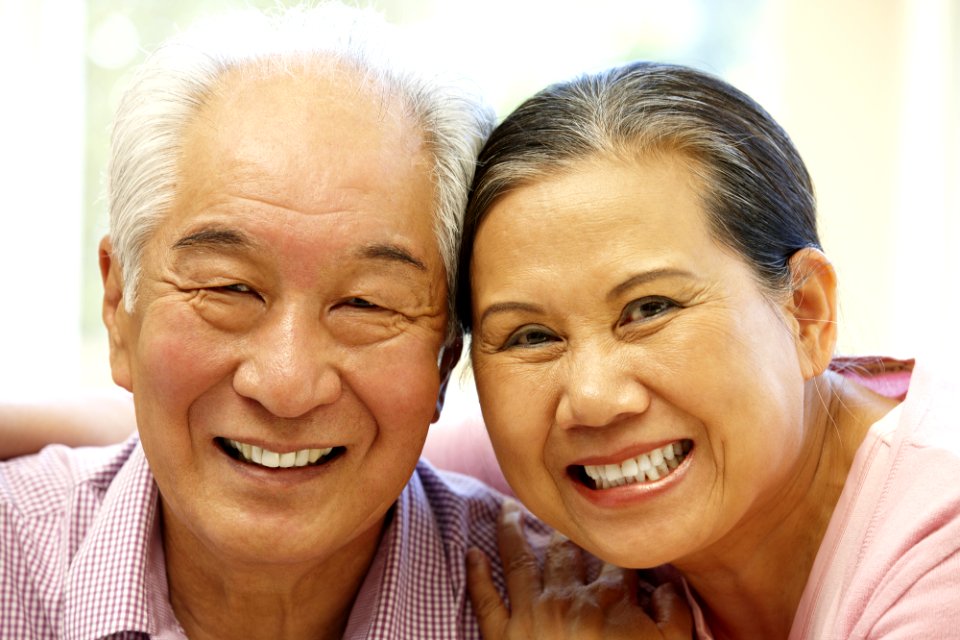 Senior Asian couple at home
