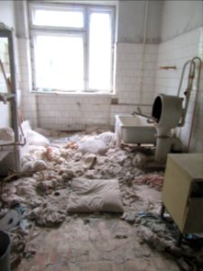 Lots of material falling apart Pripyat hospital Chernobyl exclusion zone Ukraine