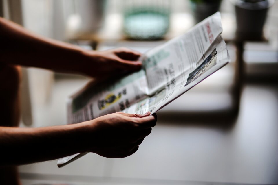 Read reading newspaper