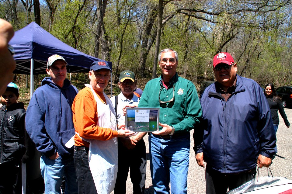 Longtime Volunteer of Kid's Fishing Day, Bob Jackson, Recieves Plaque of Appreciation from Regional Director Tom Melius