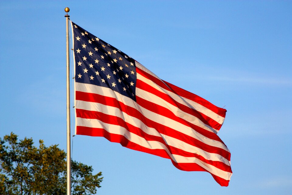American flag waving flag stars and stripes