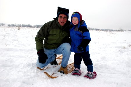 Regional Director Tom Melius has a good time snowshoeing with visitor Evan Stottlemyre