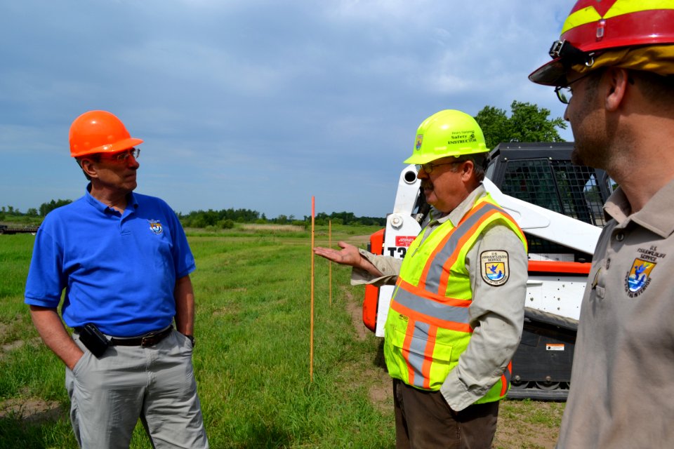 Regional Director Tom Melius meets with Instructor David Myhrer