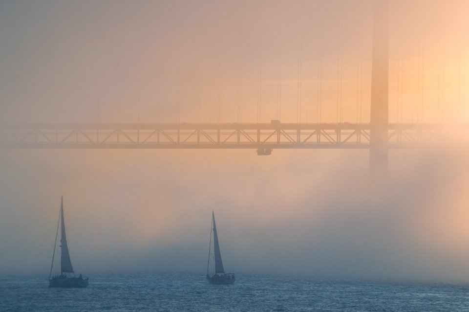 Lisbon, Tagus river, fog, mist, sea,golden hour, light, sun, sunset, bridge