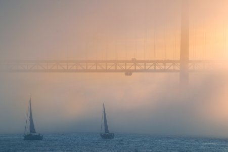 Lisbon, Tagus river, fog, mist, sea,golden hour, light, sun, sunset, bridge photo
