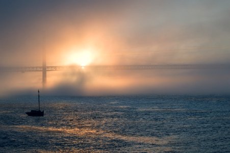 Tagus river, fog, mist, sea,golden hour, light, sun, sunset