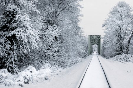 Train trestle in the snow, Willamette Valley, Oregon photo
