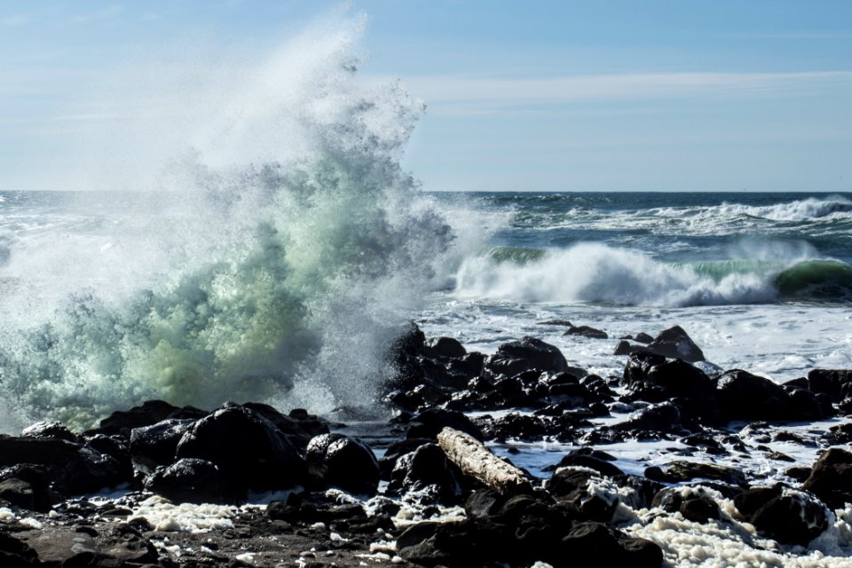 Big waves with light coming through, Oregon coast.