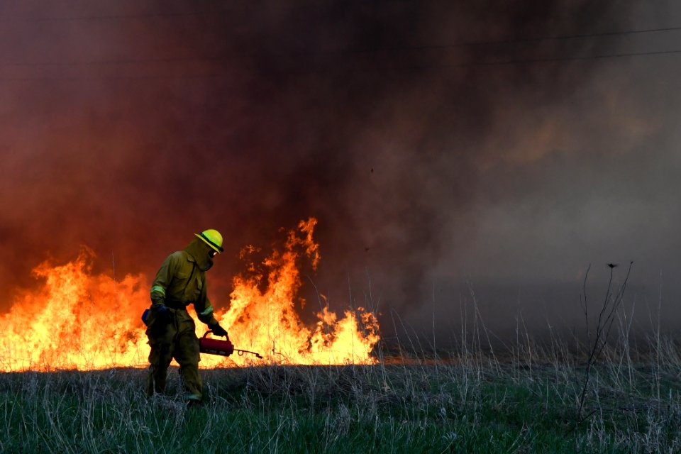 Crews perform a controlled burn at Schlee Waterfowl Production Area