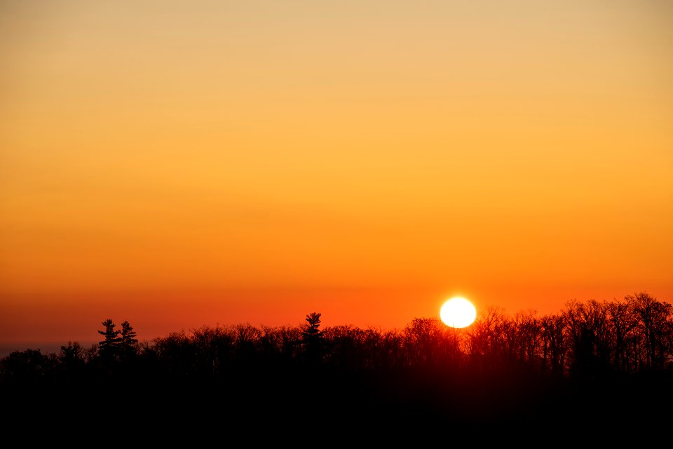 Sunrise Along a Silhouette Ridge