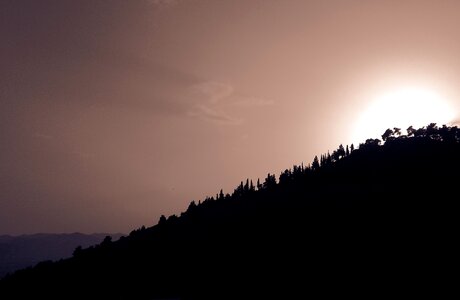 Silhouette black sunset black mountain photo