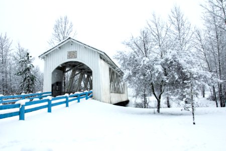 Covered bridge in snow, Willamette Valley, Oregon photo