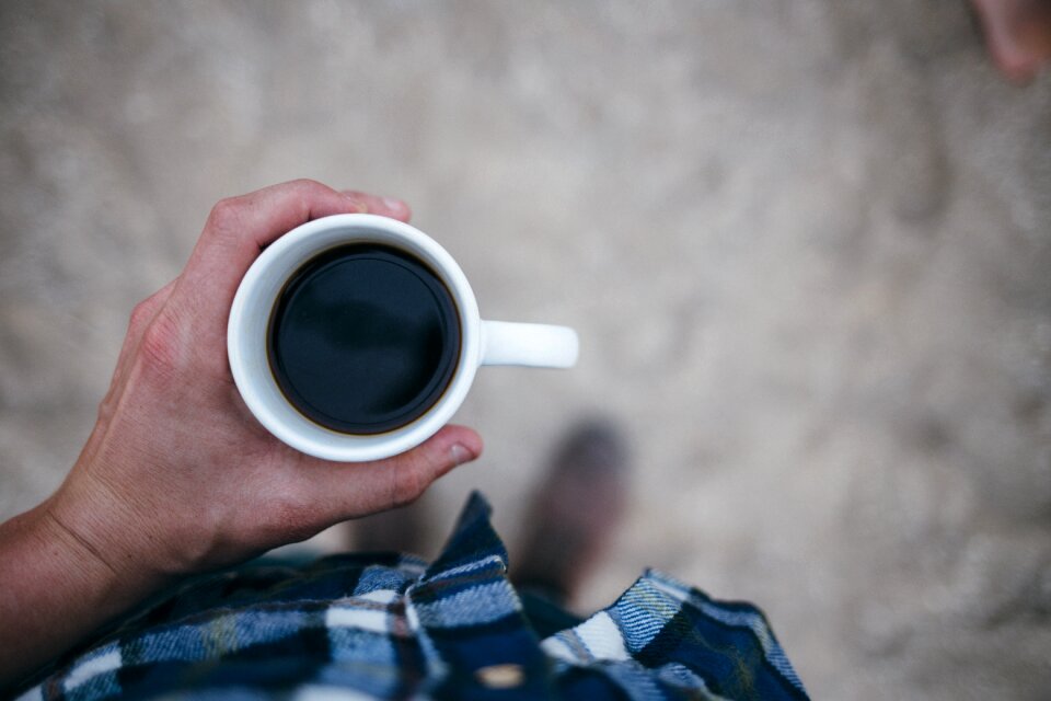 Holding cup drink photo