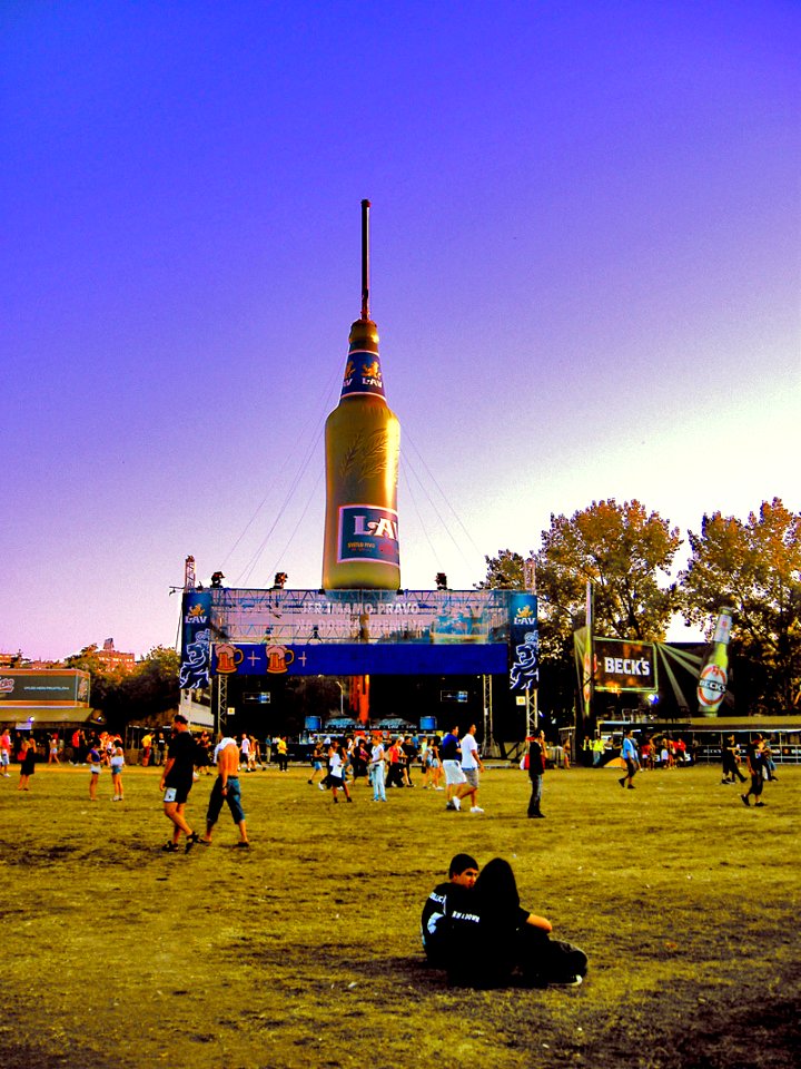 Big bottle over purple sky
