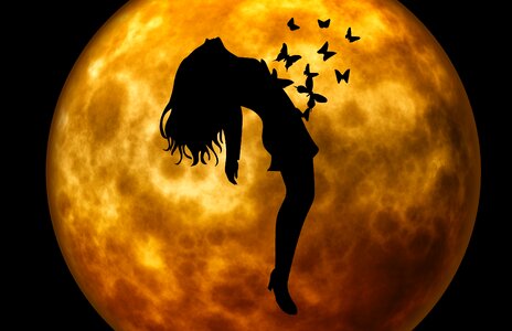 Moonlight woman silhouette photo