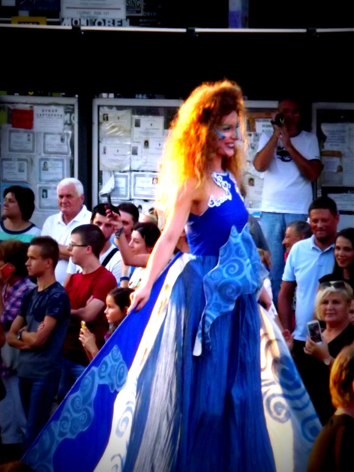 Girl Walking on Stilts