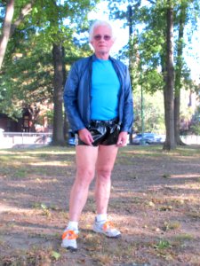 Posing for a photo in my shiny vinyl short shorts.
