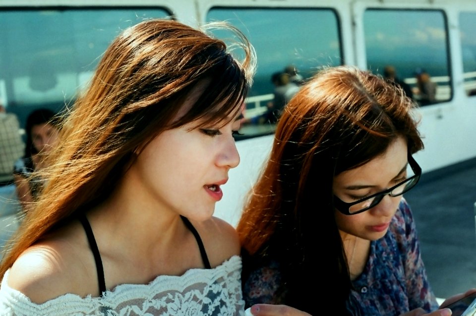 Sisters chatting on the Ferry