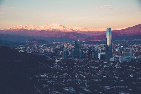 Urban aerial view snowy mountains photo