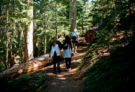 sister helping sister, hiking