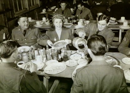 Martha Raye dining at Fort Leonard Wood, Missouri in 1942