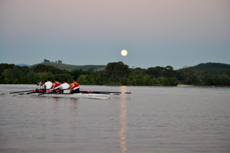 Rowers under the moon photo