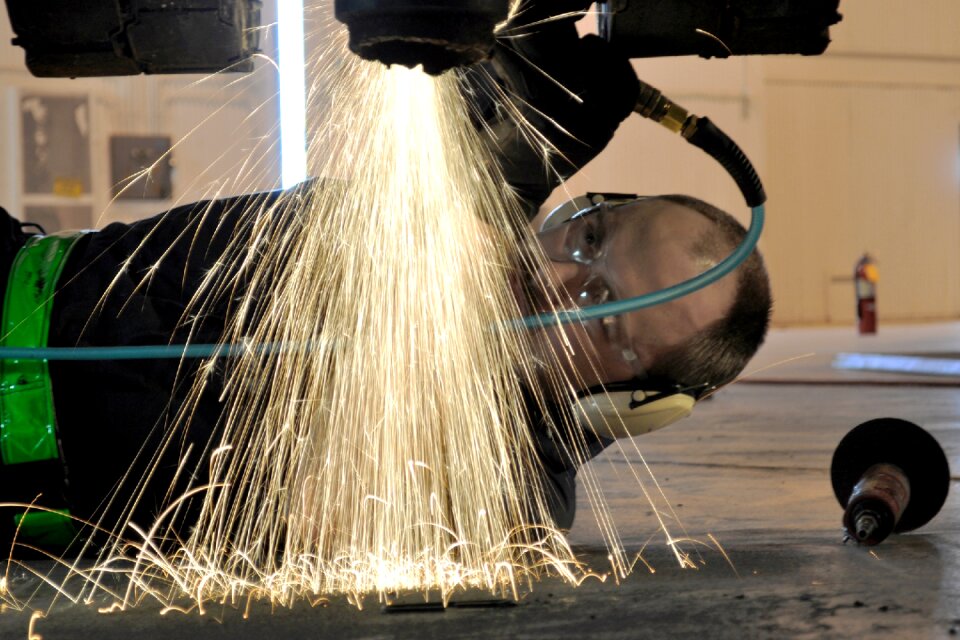 Grinder sparks metal