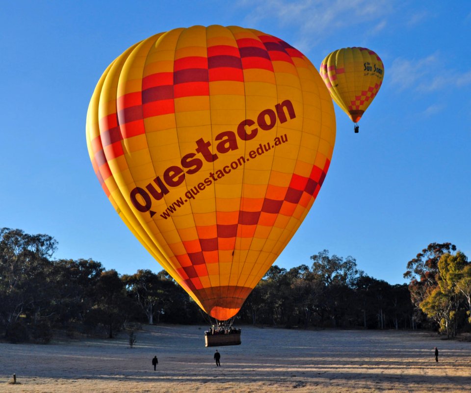 Hot air balloons coming in to land