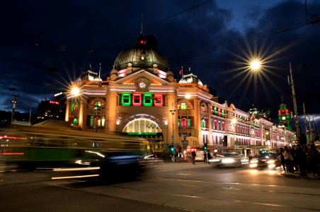 Tram passing Flinders Street Station photo