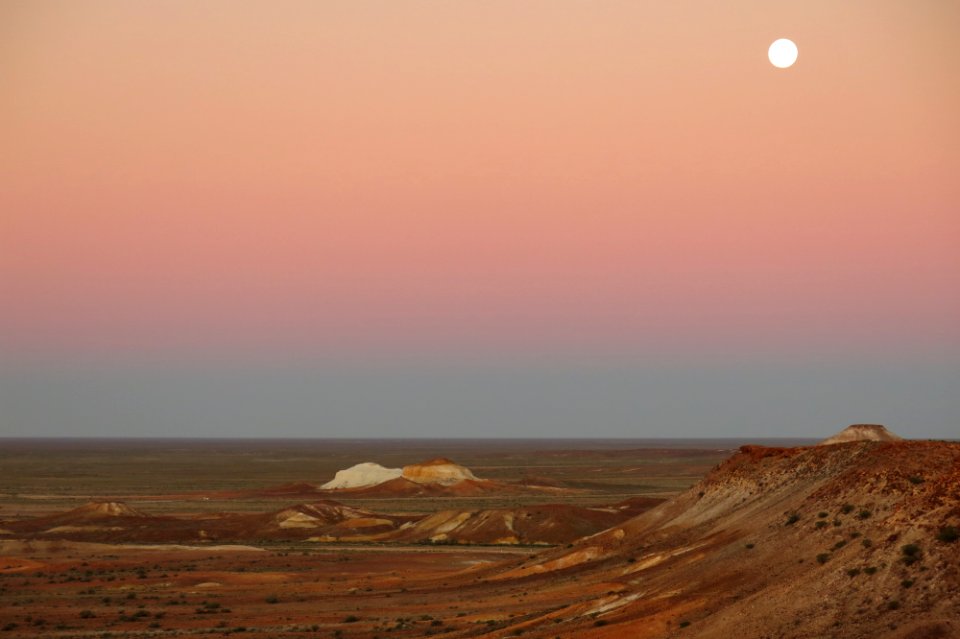 Moonrise at sunset at the Breakaways