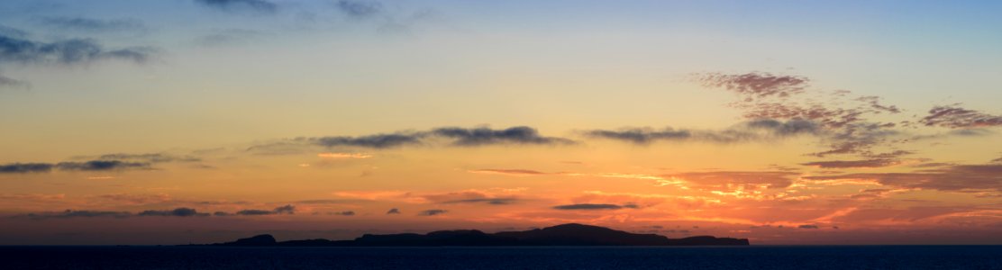 Sunset over Fair Isle, Scotland photo