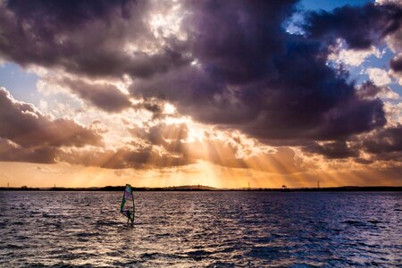 Sunset windsurfing water photo