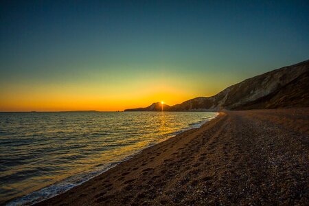 Worbarrow bay ocean sunset