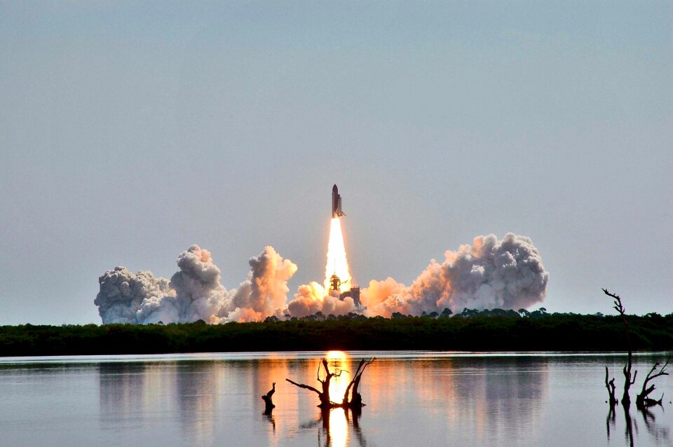 Astronauts liftoff rockets
