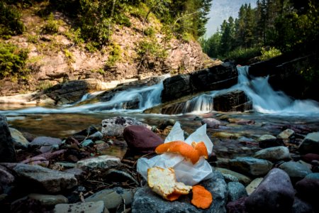 Trash Near a Waterfall photo