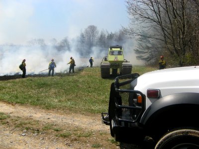 Firefighters and equipment at controlled burn