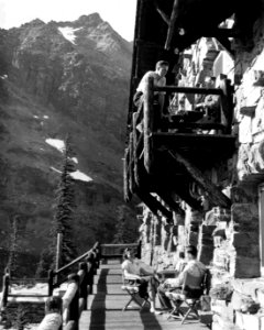 Tourist on balcony of Sperry Chalet 1940 T.J. Hileman Photograph