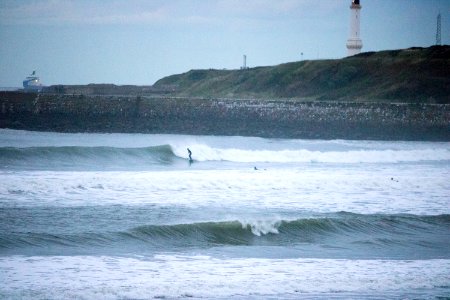 Surfers on Aberdeen Harbour in the Evening