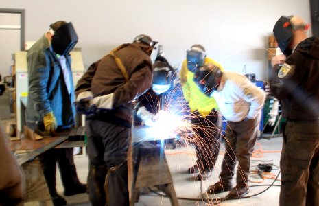 Joe Bertrand teaches welding