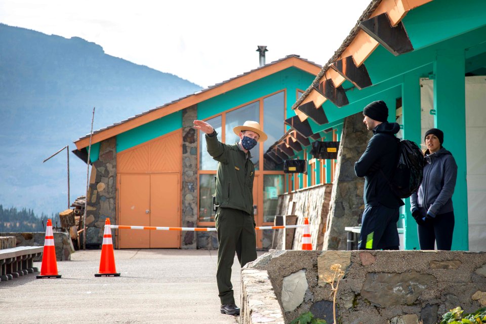 Ranger Talking to Visitors at Logan Pass Visitor Center