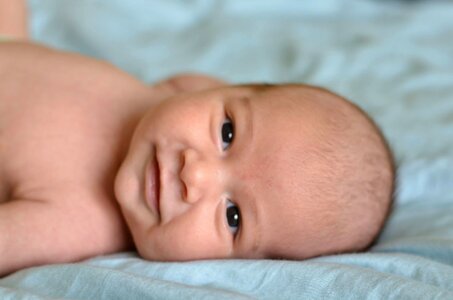 Infant portrait brown smile