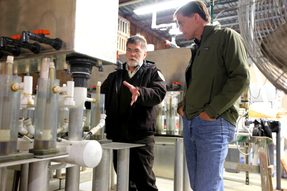 Project Leader Ken Gillette shows Dan around